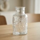 Formad Glasvas Med Rosor Genomskinlig